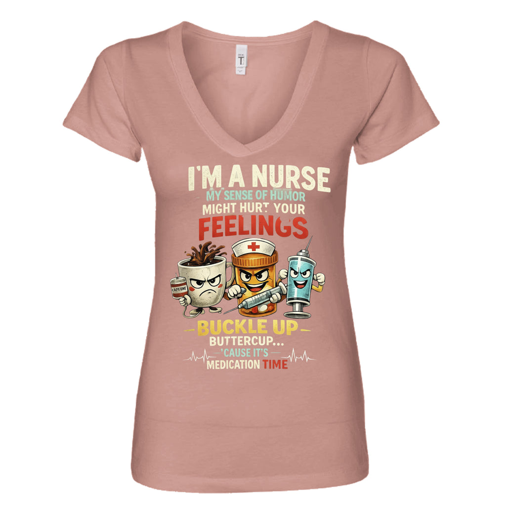 Desert Pink - nurse-themed graphic t-shirt featuring healthcare characters and the phrase "I'm a Nurse, My Sense of Humor Might Hurt Your Feelings. Buckle Up Buttercup, It's Medication Time."