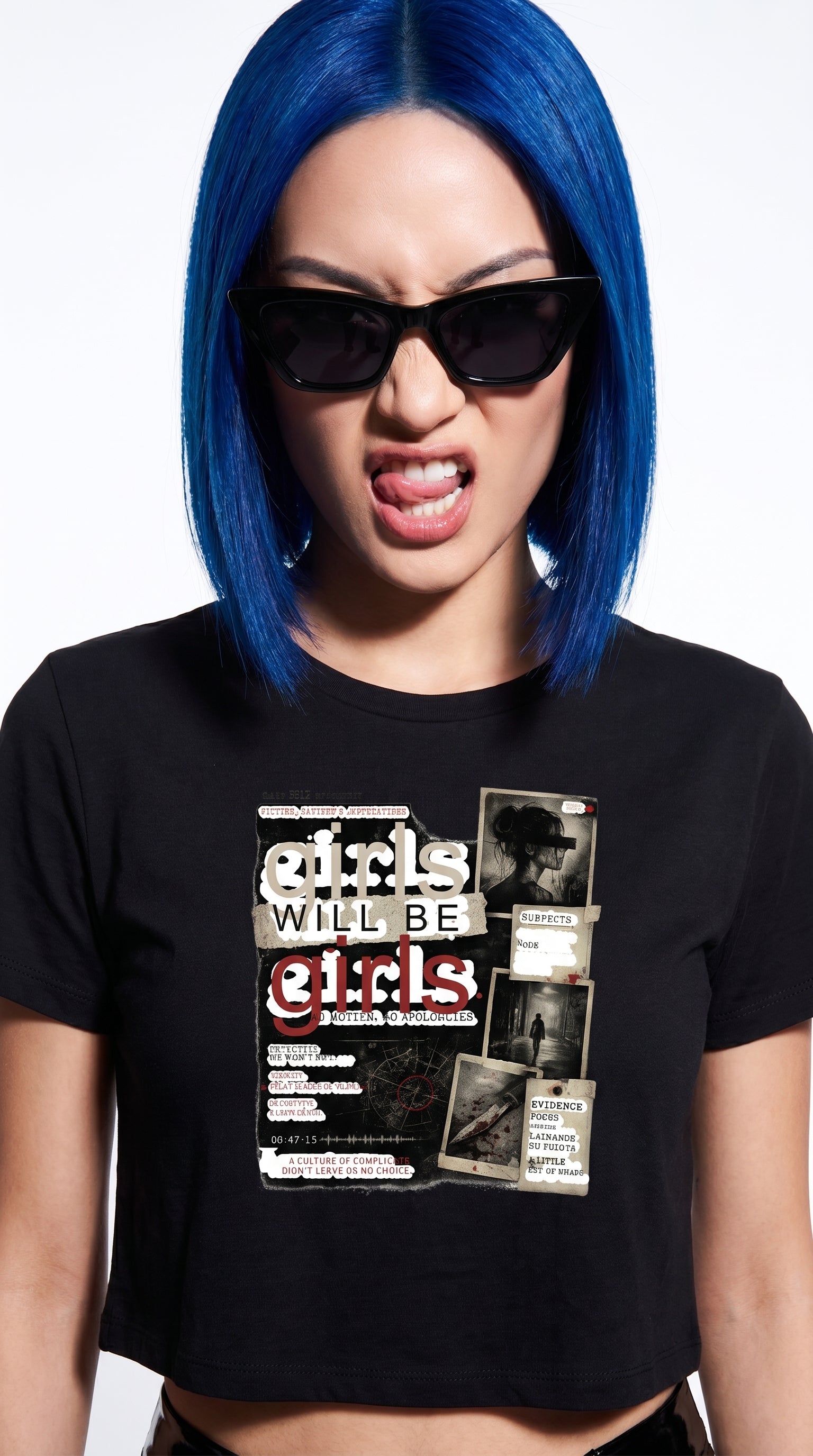 Woman wearing a black graphic t-shirt featuring a true crime-inspired collage design with the phrase "Girls Will Be Girls" and investigative evidence board artwork.