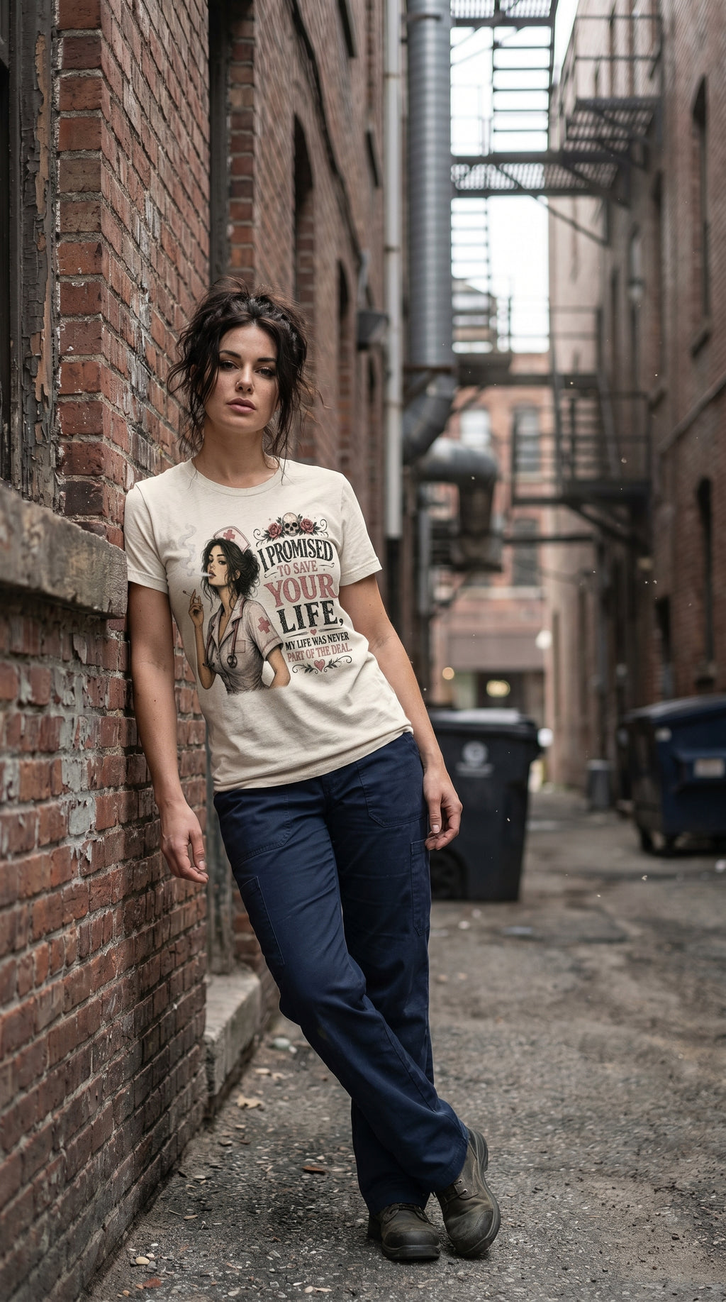 Woman wearing a nurse-themed graphic t-shirt featuring vintage artwork and the phrase "I Promised to Save Your Life, My Life Was Never Part of the Deal."